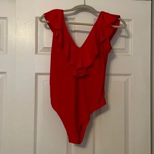Red bodysuit. Deep V front and tie back